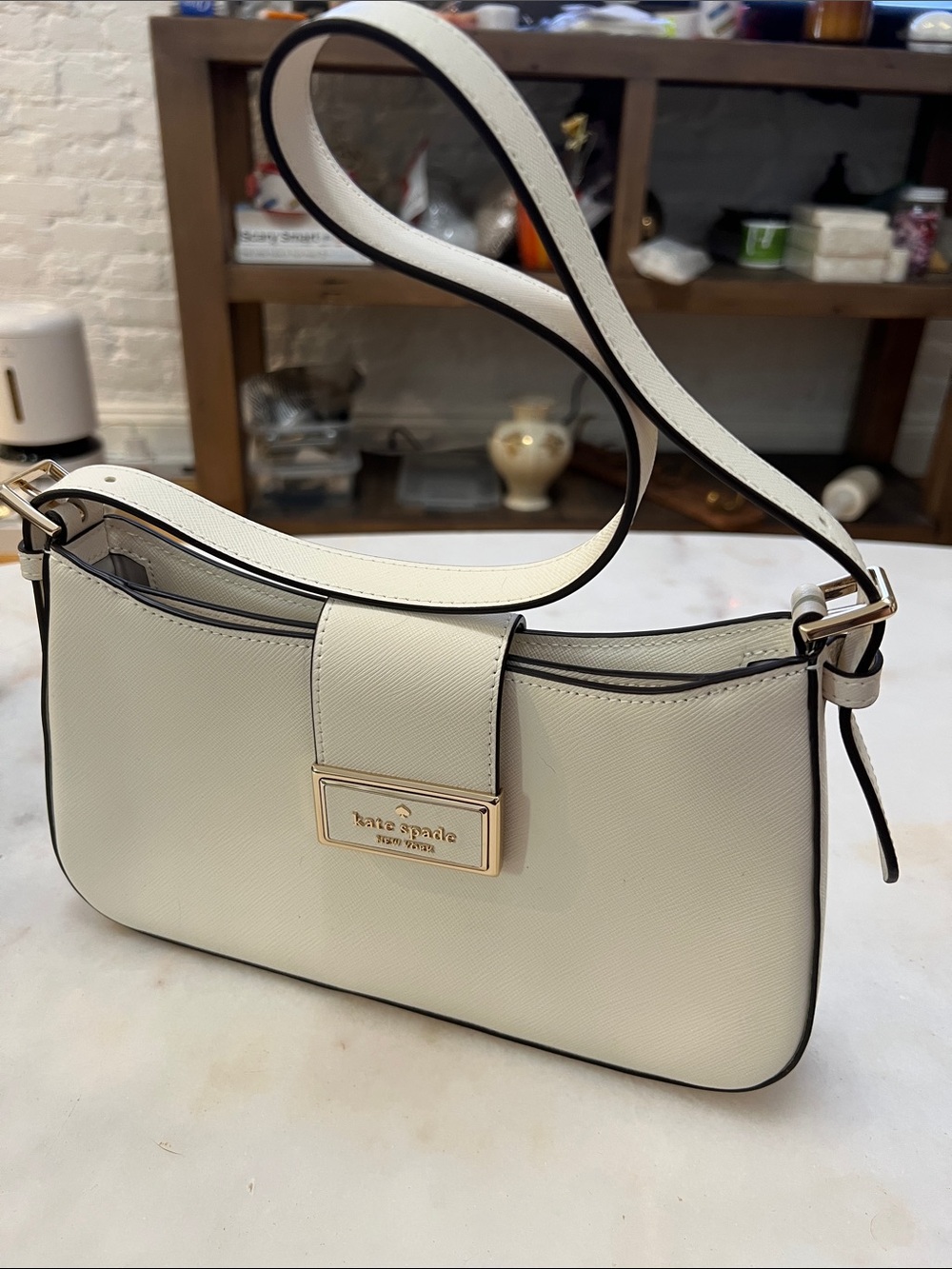 kate spade Ivory Saffiano Shoulder Bag with Gold Plaque
